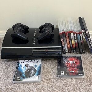 PS3 60GB, 10 ps3 games included plus 2 bonus games